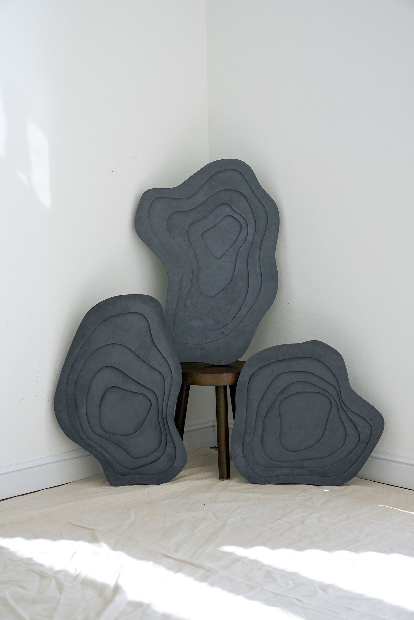 Three-piece textured wall art "Volcanic Noir"